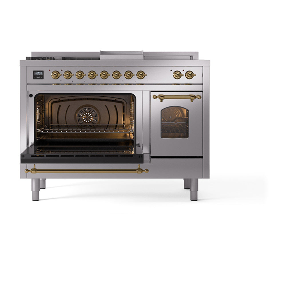Stainless dual fuel range with one oven open and brass handle trim