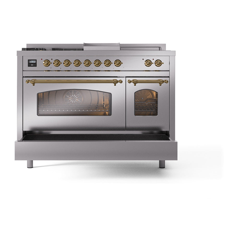Stainless steel dual fuel range with glass oven doors and brass control knobs