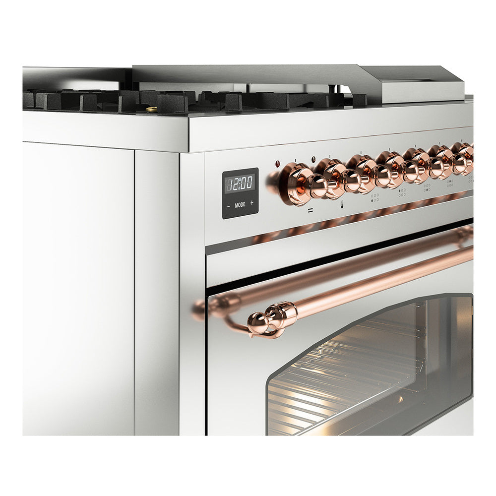 Stainless steel dual fuel range control panel with copper knobs above oven window