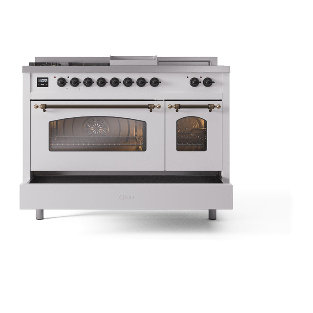 White dual-fuel gas range with bronze trim, front view with oven windows and control knobs