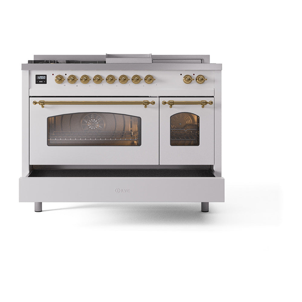 White dual fuel gas range, front double-oven doors closed, brass controls