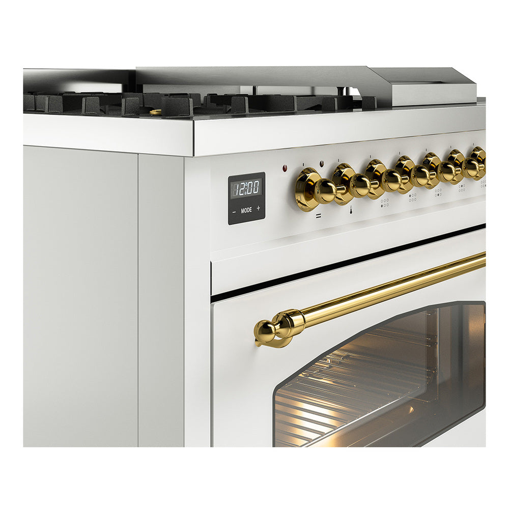 White gas range control panel with brass knobs and large oven glass window
