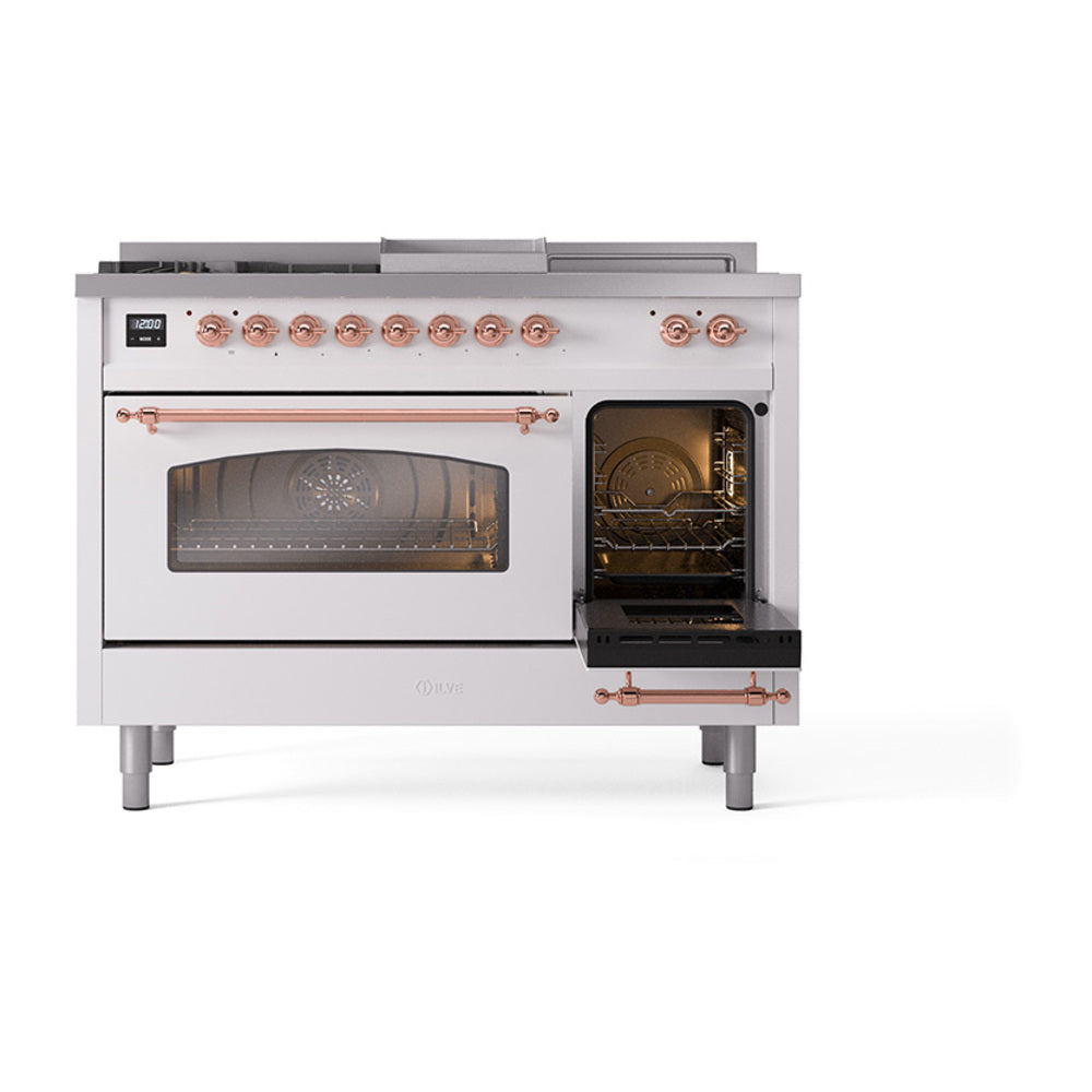 White dual-fuel range with oven door ajar, copper-trimmed controls.