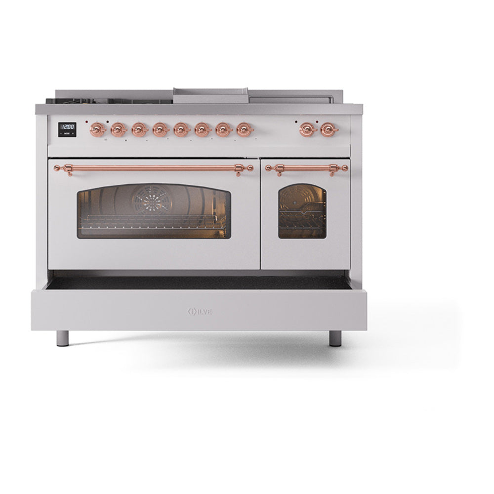 White dual-fuel range front view with copper knobs, large oven glass, and side oven door