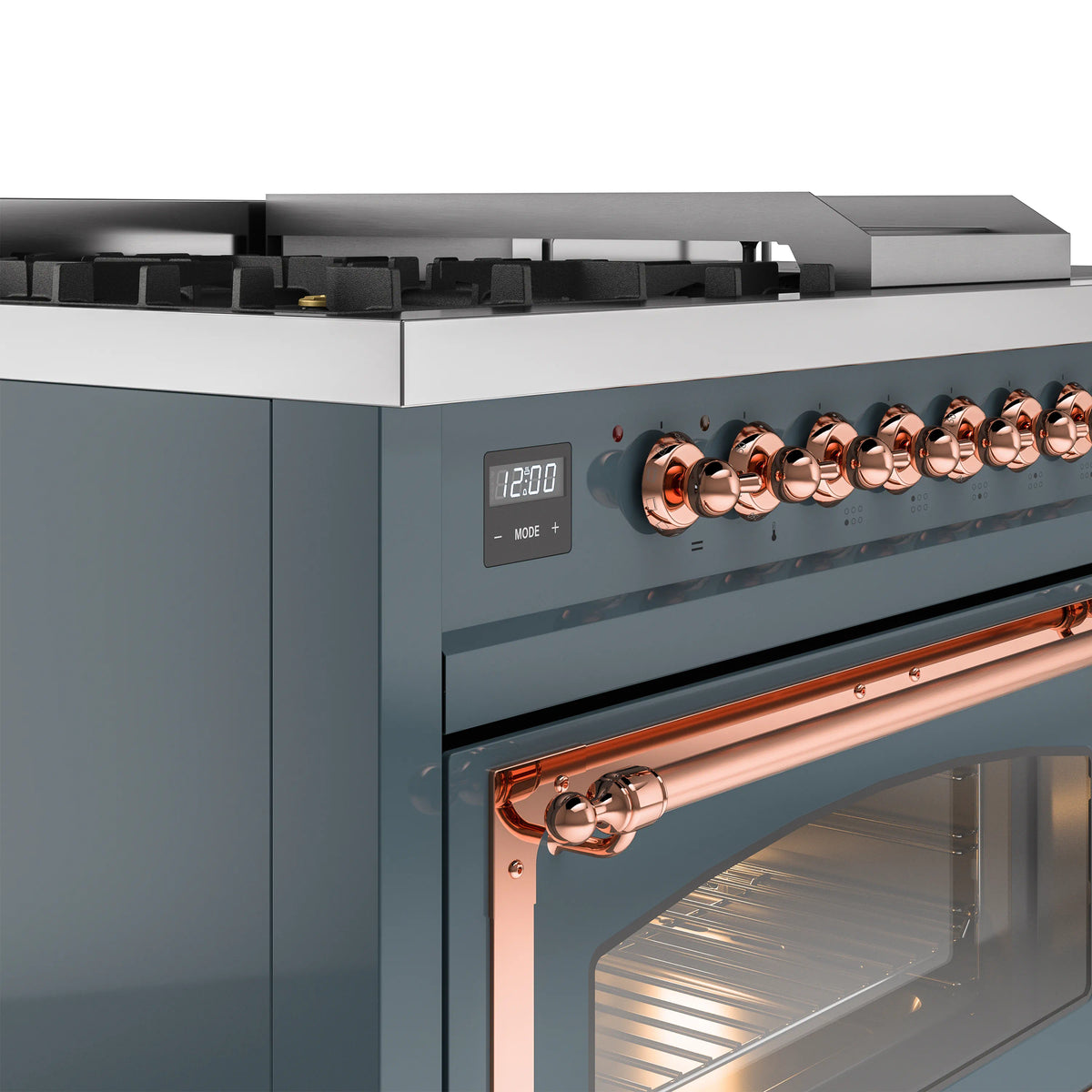 Dual fuel range control panel with copper knobs and blue-grey oven door with glass