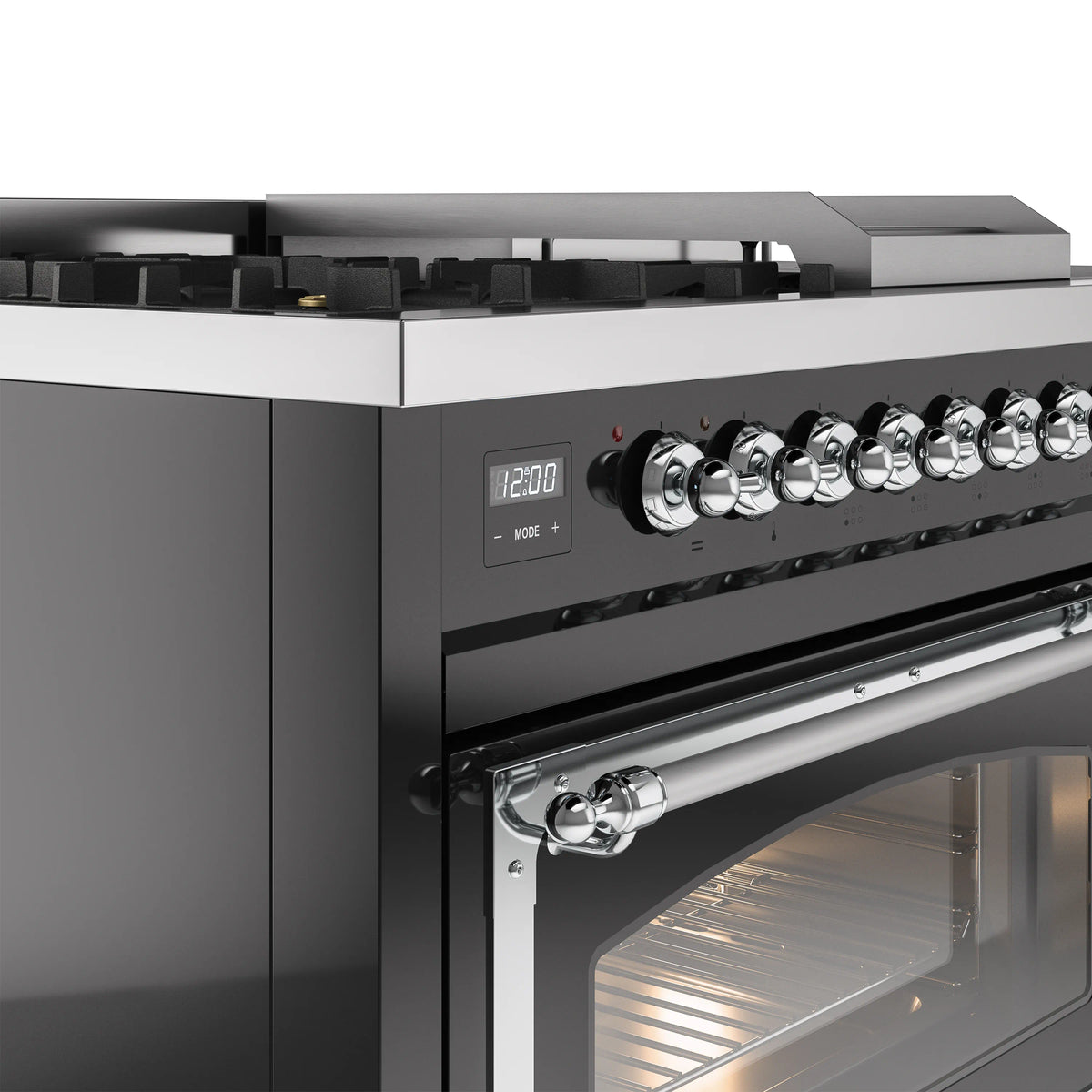 Glossy black dual fuel range control panel with chrome knobs and oven handle trim