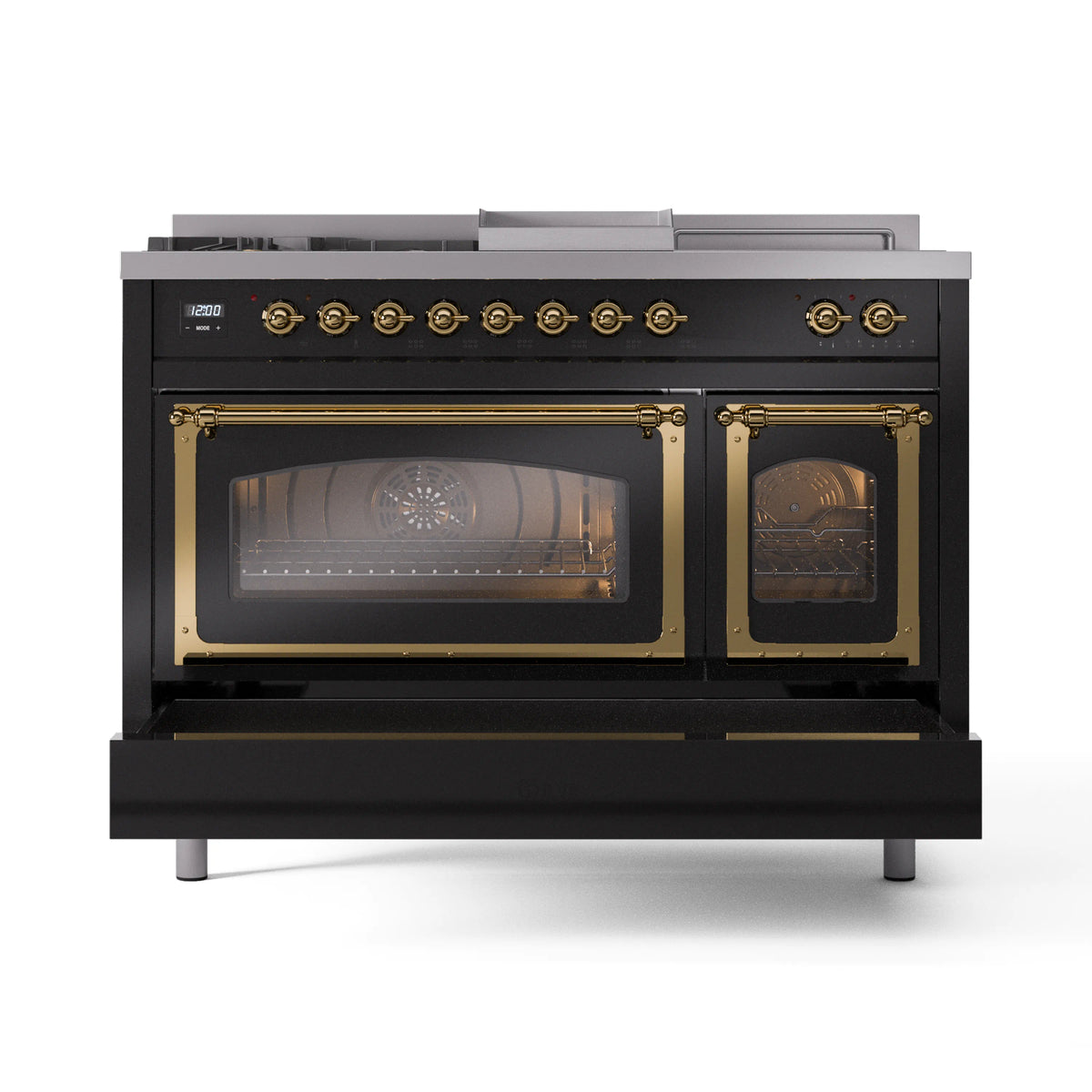 Nostalgic black dual-oven range with brass trim, triple glass door fronts, and knobs.