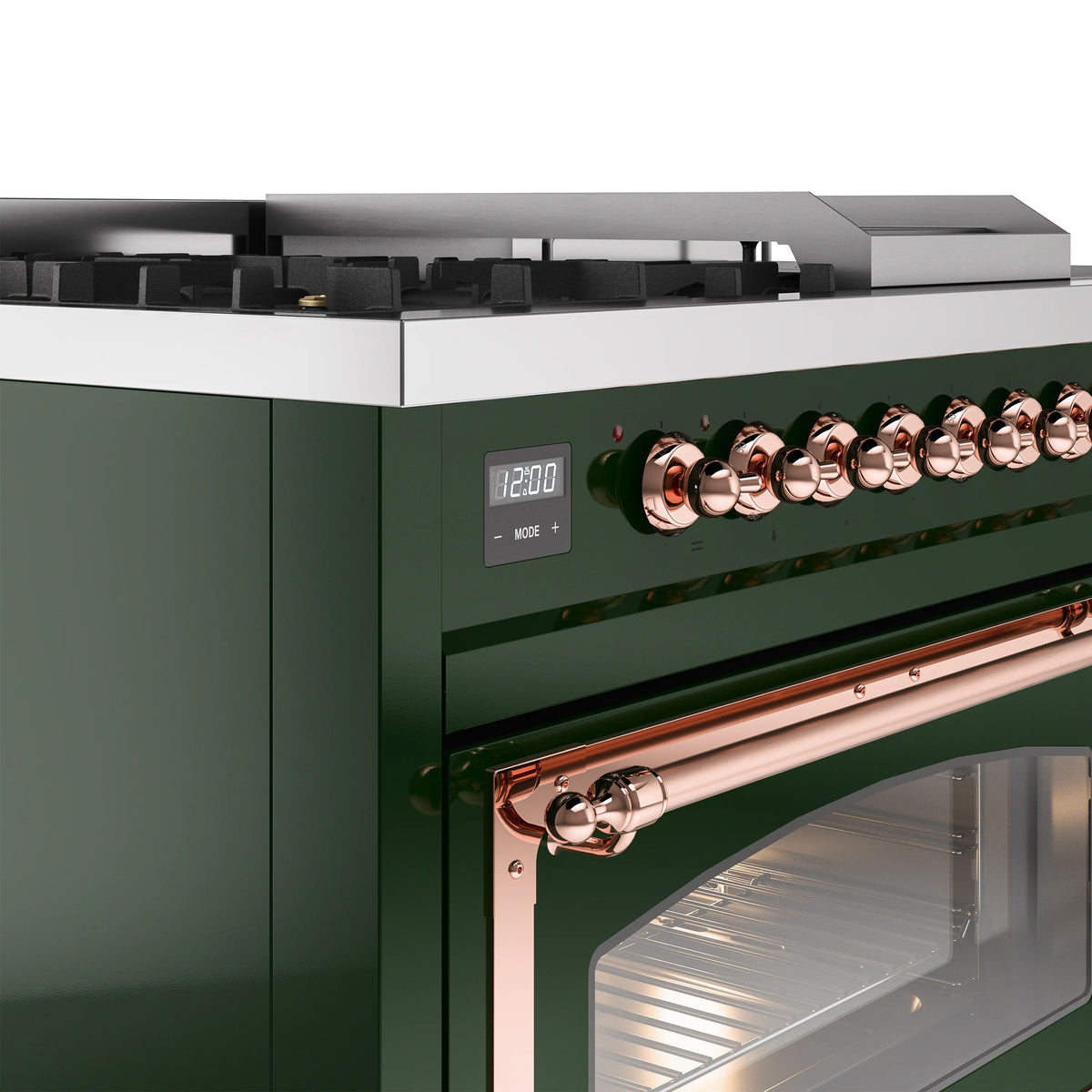Close-up of emerald green range front with copper control knobs and oven door edge