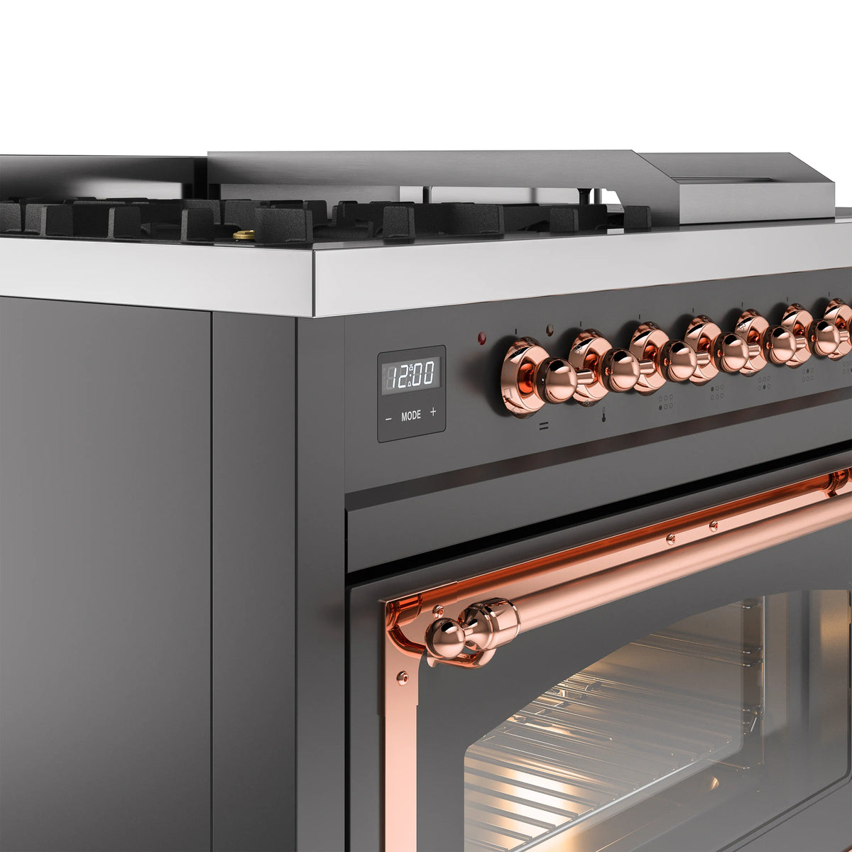 Close-up of matte graphite range control panel with copper knobs and digital display