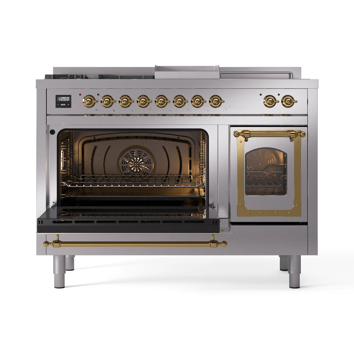 Stainless steel dual fuel range with brass-trimmed controls and open triple-door oven