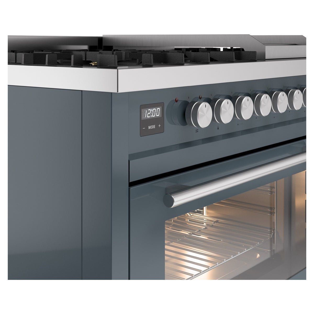 Blue-grey dual fuel range, close-up of control knobs and oven window