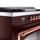 ILVE 60-Inch Nostalgie II Noblesse Natural Gas Dual Fuel Range with 7 Sealed Burners, Griddle, French Top and Triple Glass Door Oven in Burgundy with Copper Trim (UN60FSNMPBUP)