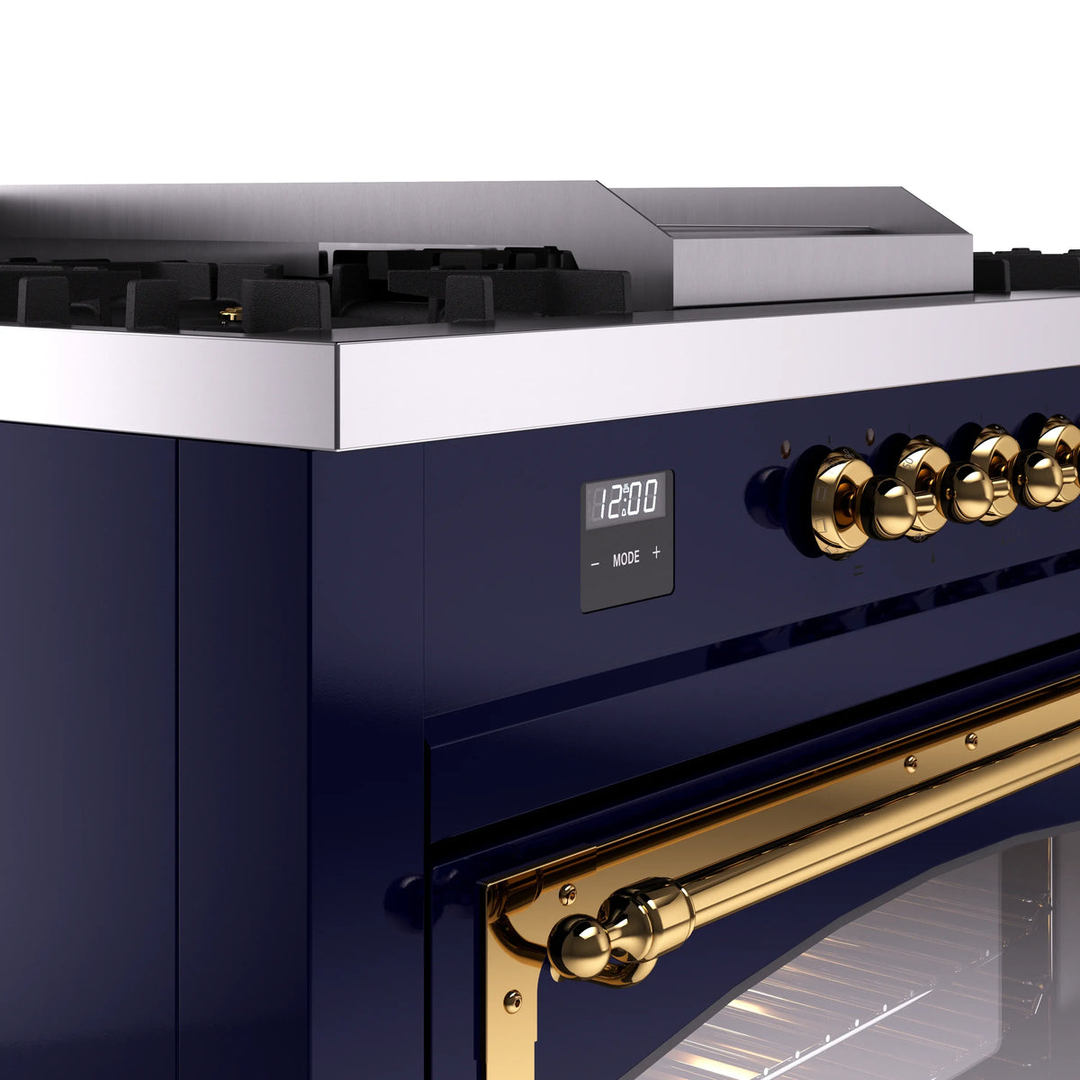 Midnight blue dual fuel range control panel with brass knobs and digital display