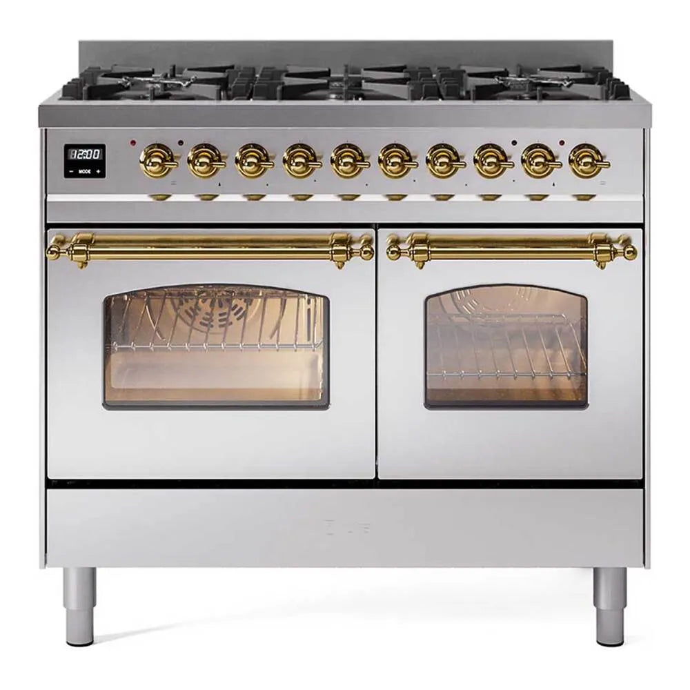 Stainless dual-fuel range with two oven windows and brass control knobs