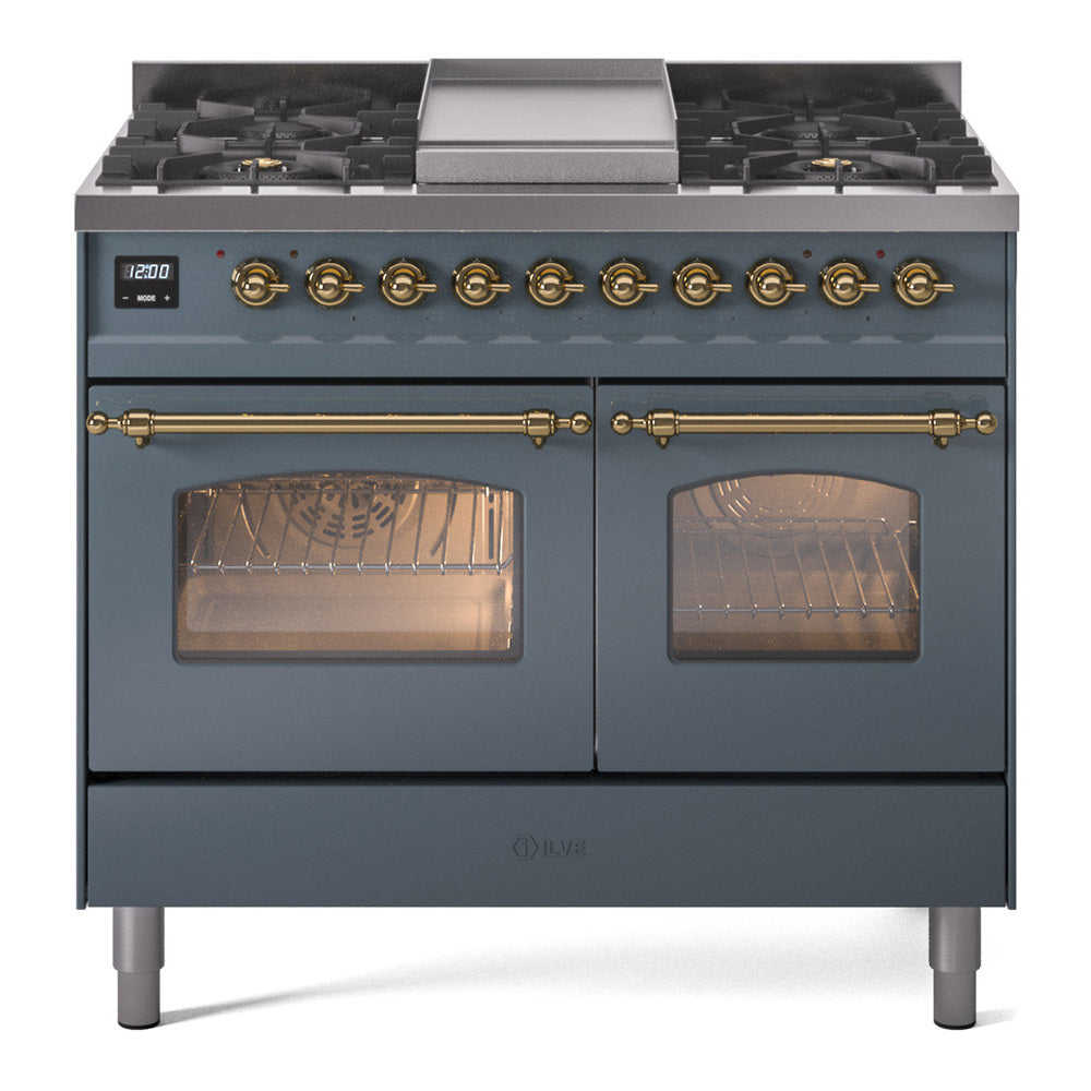 Blue grey freestanding dual fuel range with brass knobs, burners, and two oven doors