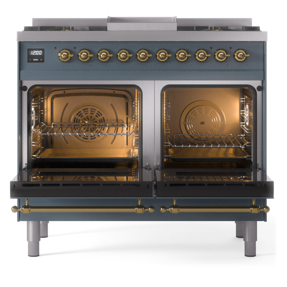 Blue grey freestanding range with two open ovens, brass handles, and control panel across top