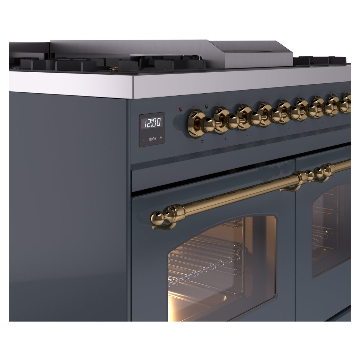 Blue grey range front corner with brass control knobs and oven door handle with glass window