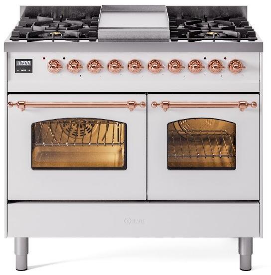White freestanding range with copper control knobs and two oven windows