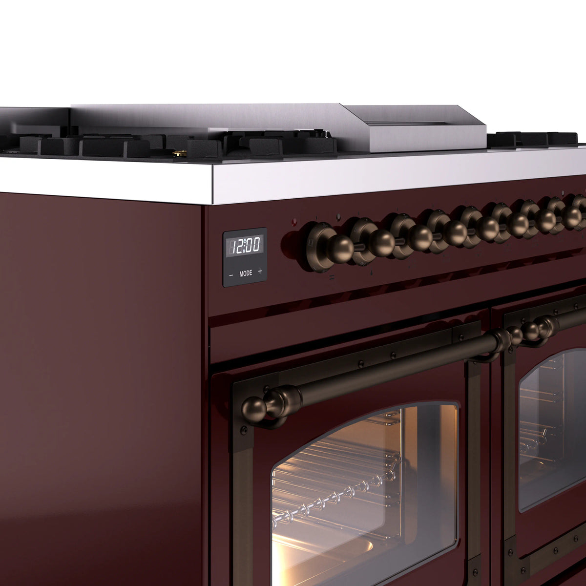 Burgundy range control panel with bronze knob row above the oven doors