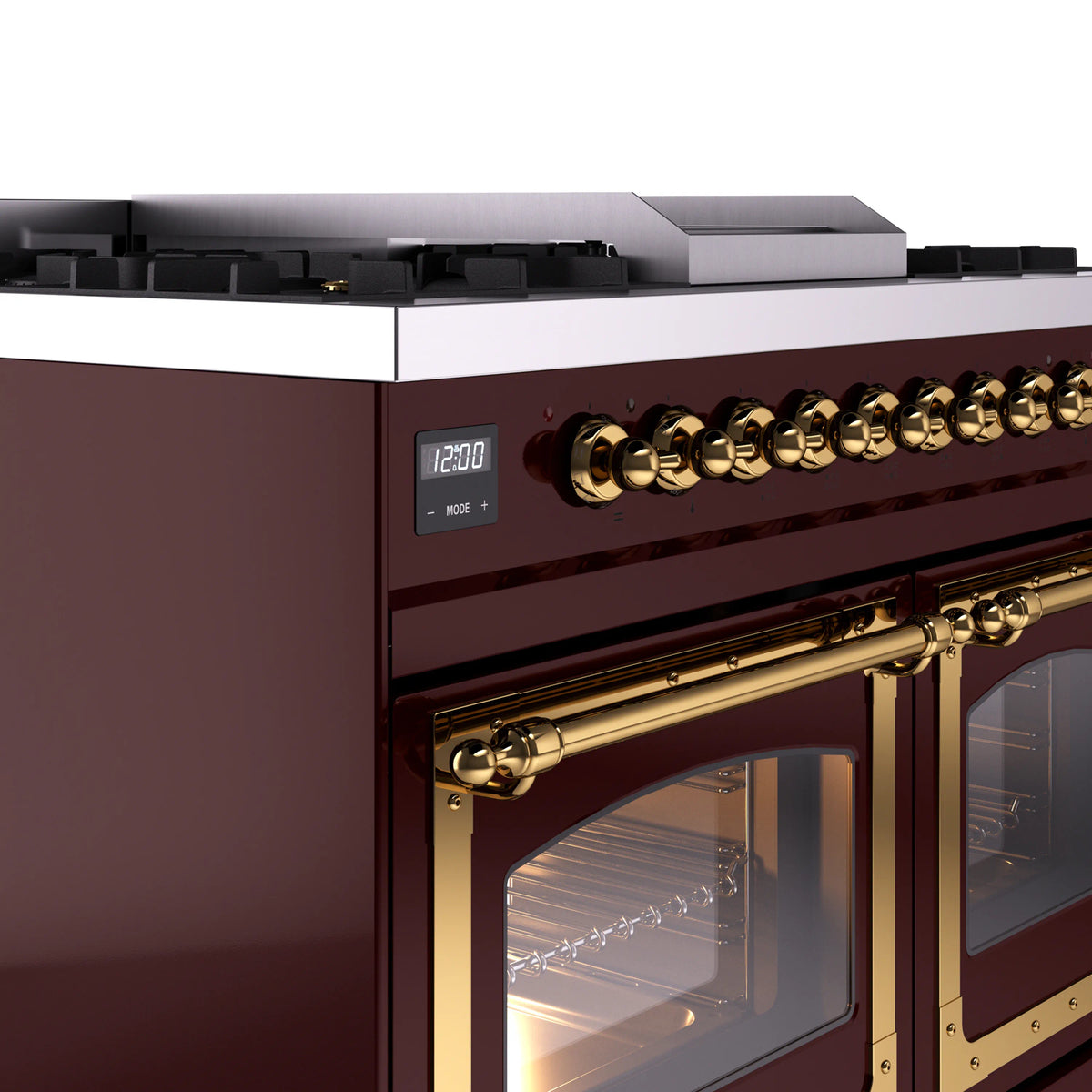 Burgundy dual-fuel range with brass control knobs and closed oven door window