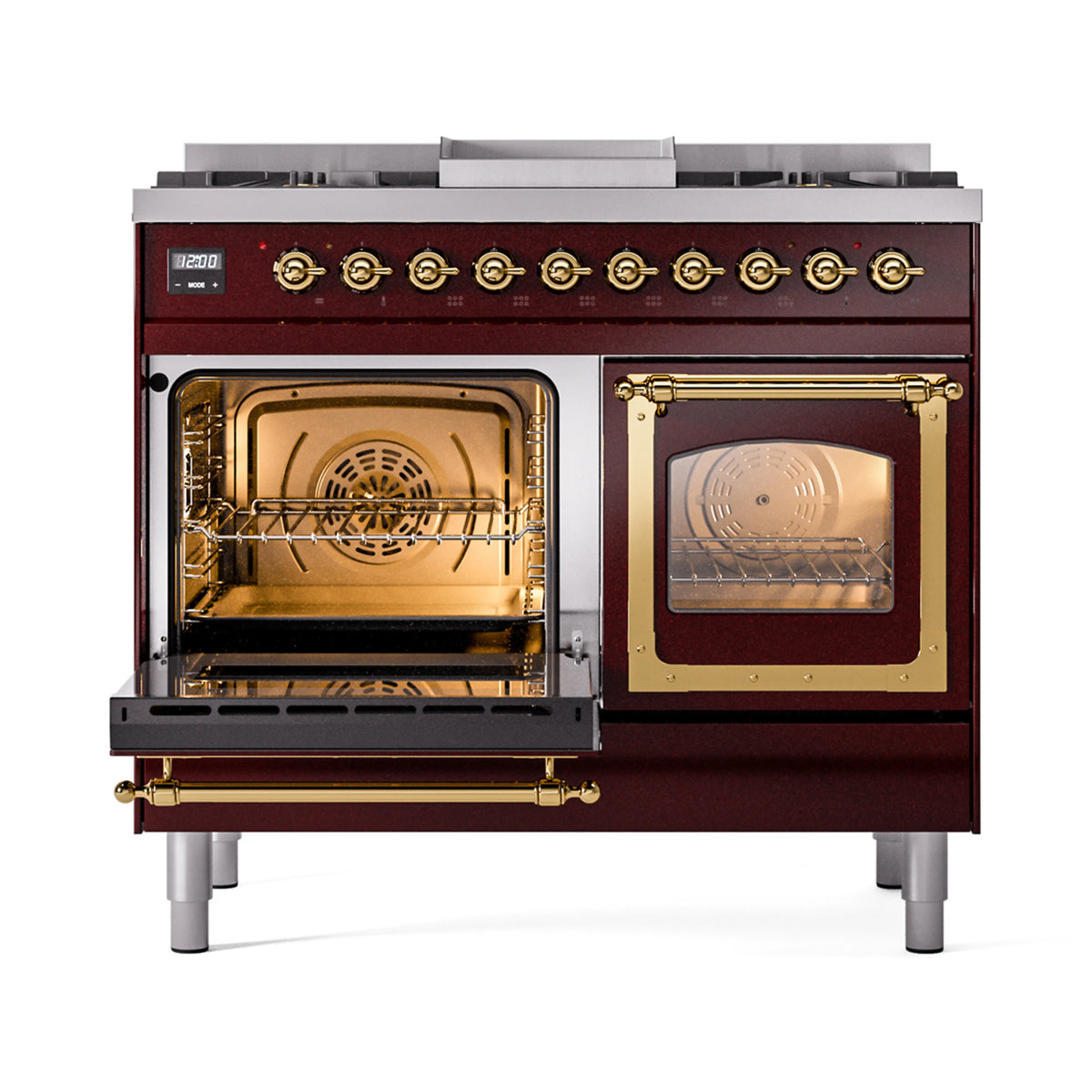 Dual-fuel gas range with one oven door open and brass accents, other oven closed