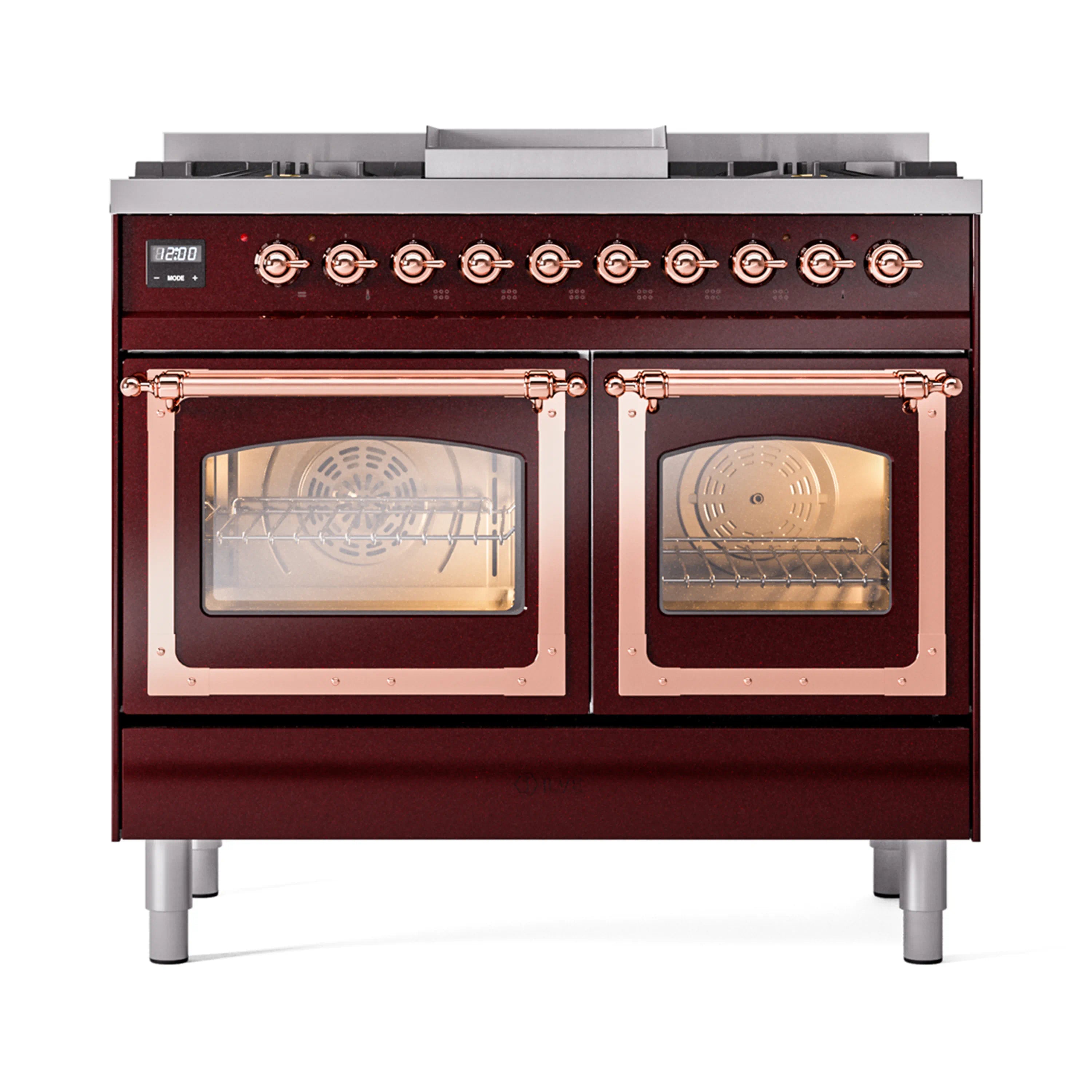 Burgundy dual oven range with copper-trim glass doors and lit oven interiors