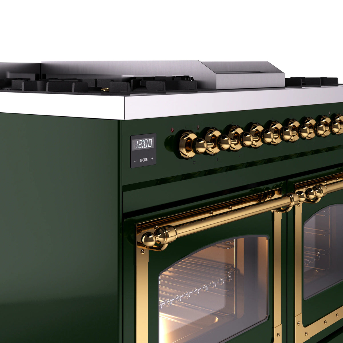 Emerald green range control panel with brass knobs and digital display above oven door