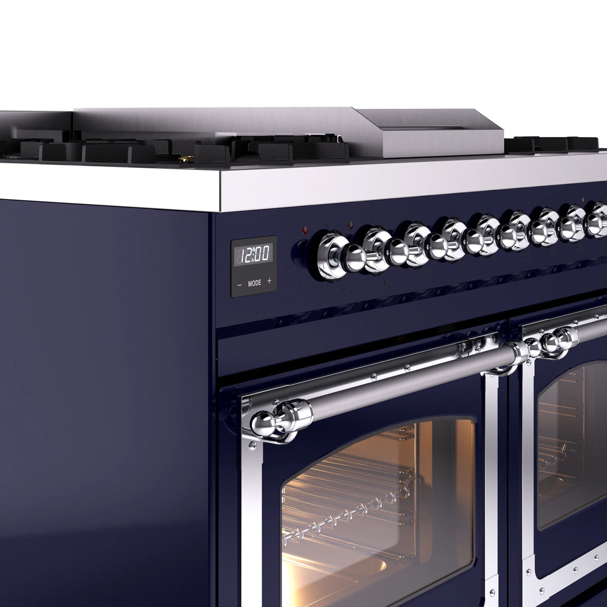 Midnight blue range control knobs and chrome oven handle with lit oven door