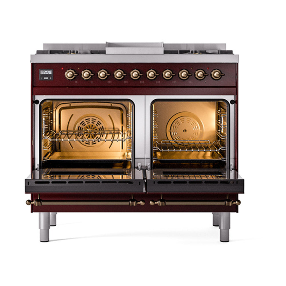 Open double oven doors on a burgundy dual fuel range with racks and lit interiors