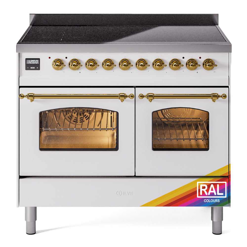 Freestanding induction range with brass knobs and two oven doors