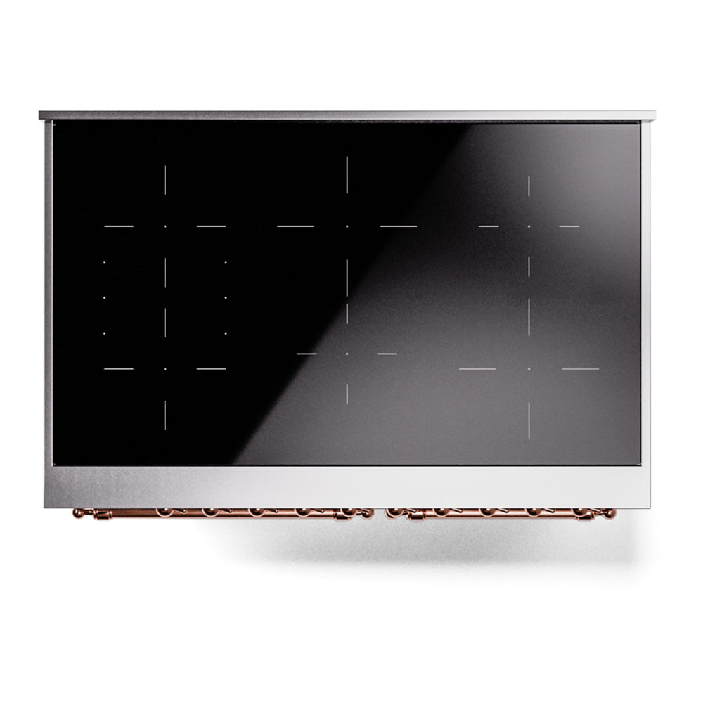 Freestanding induction range oven door with dark glass and copper trim along base