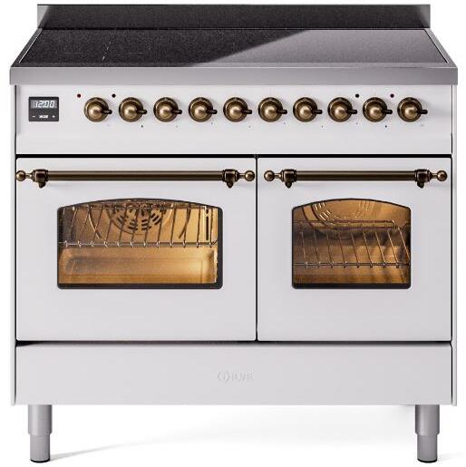 White freestanding electric induction range with bronze knobs and two glass oven doors