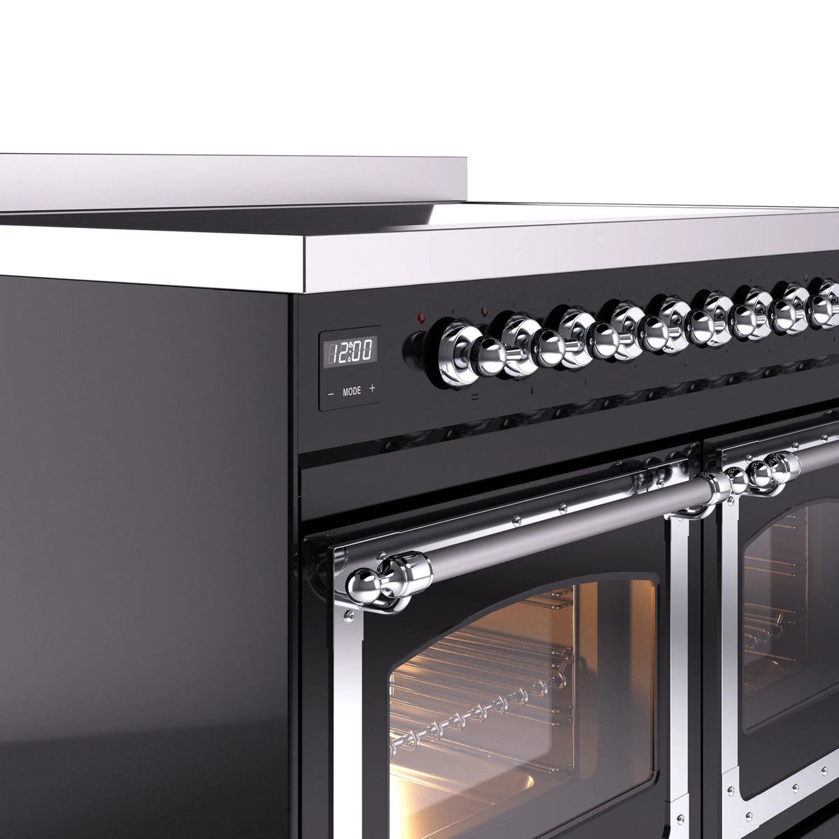 Induction range control knobs and chrome oven door handle detail
