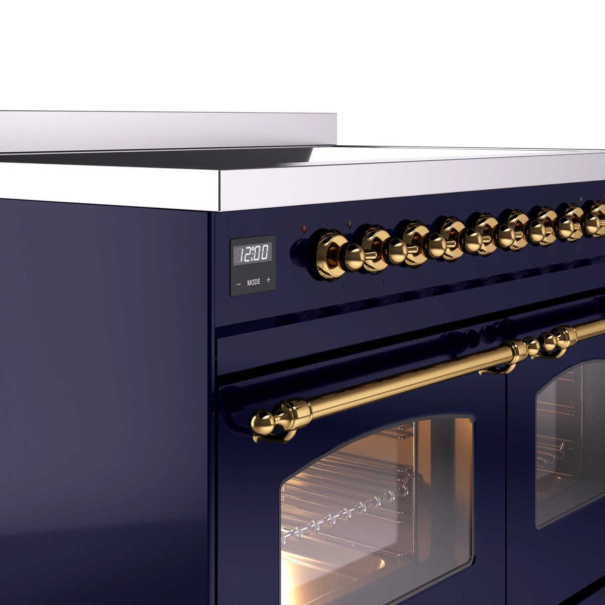 Midnight blue induction range control panel with brass knobs and digital display