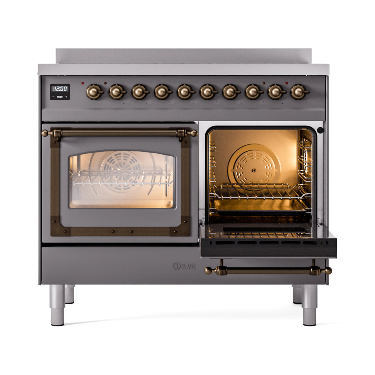 Matte graphite induction range with open left oven showing bronze-lit rack and knobs