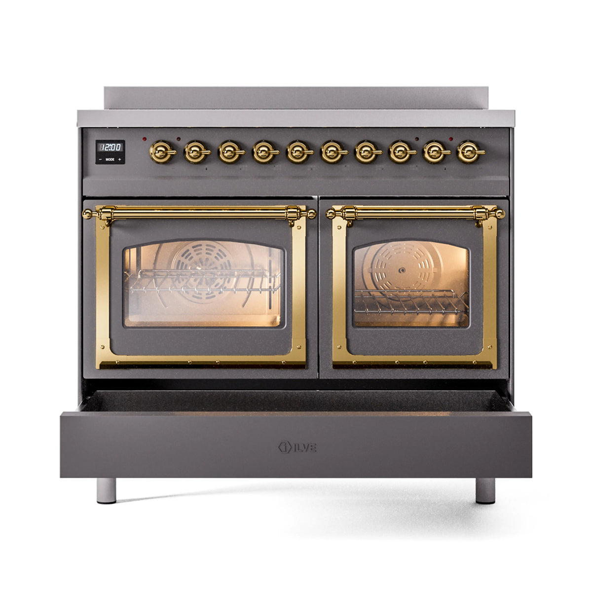 Matte graphite induction range with brass-trimmed glass doors and ornate brass handles