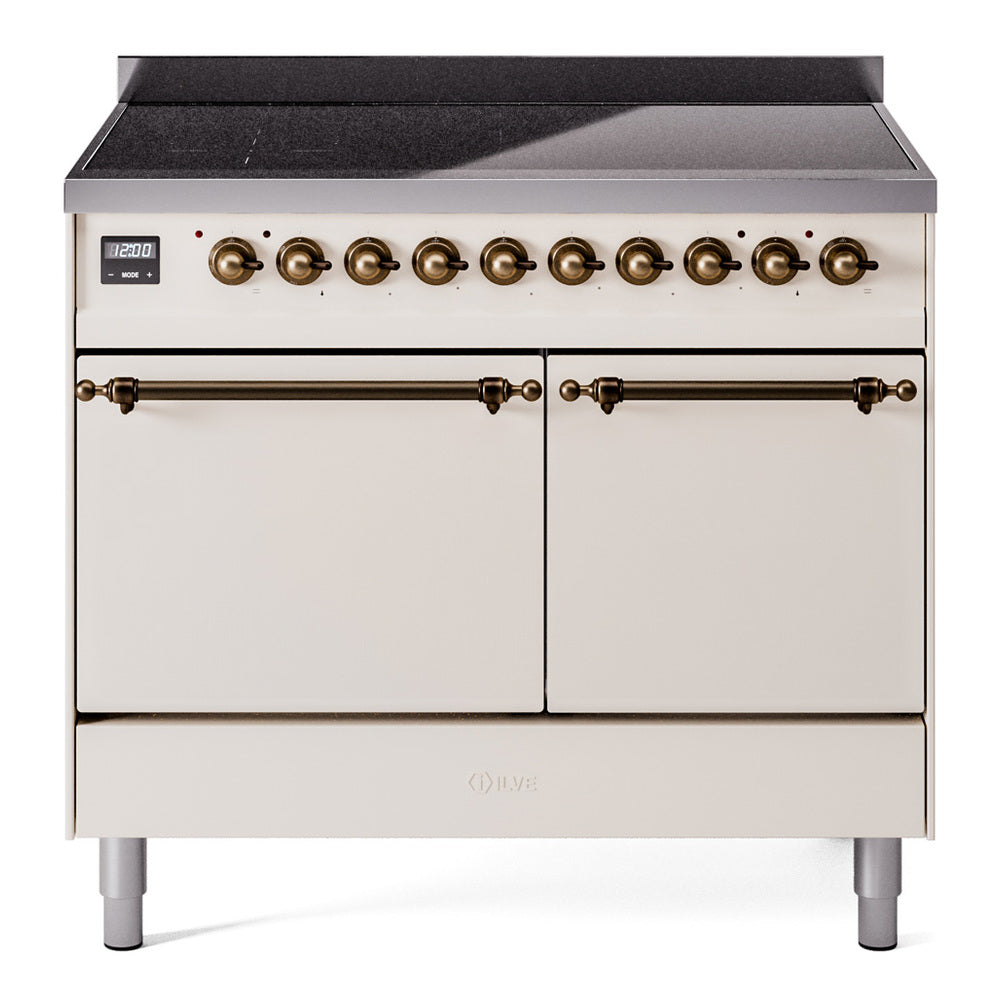 Antique white induction range with bronze control knobs and two solid oven doors