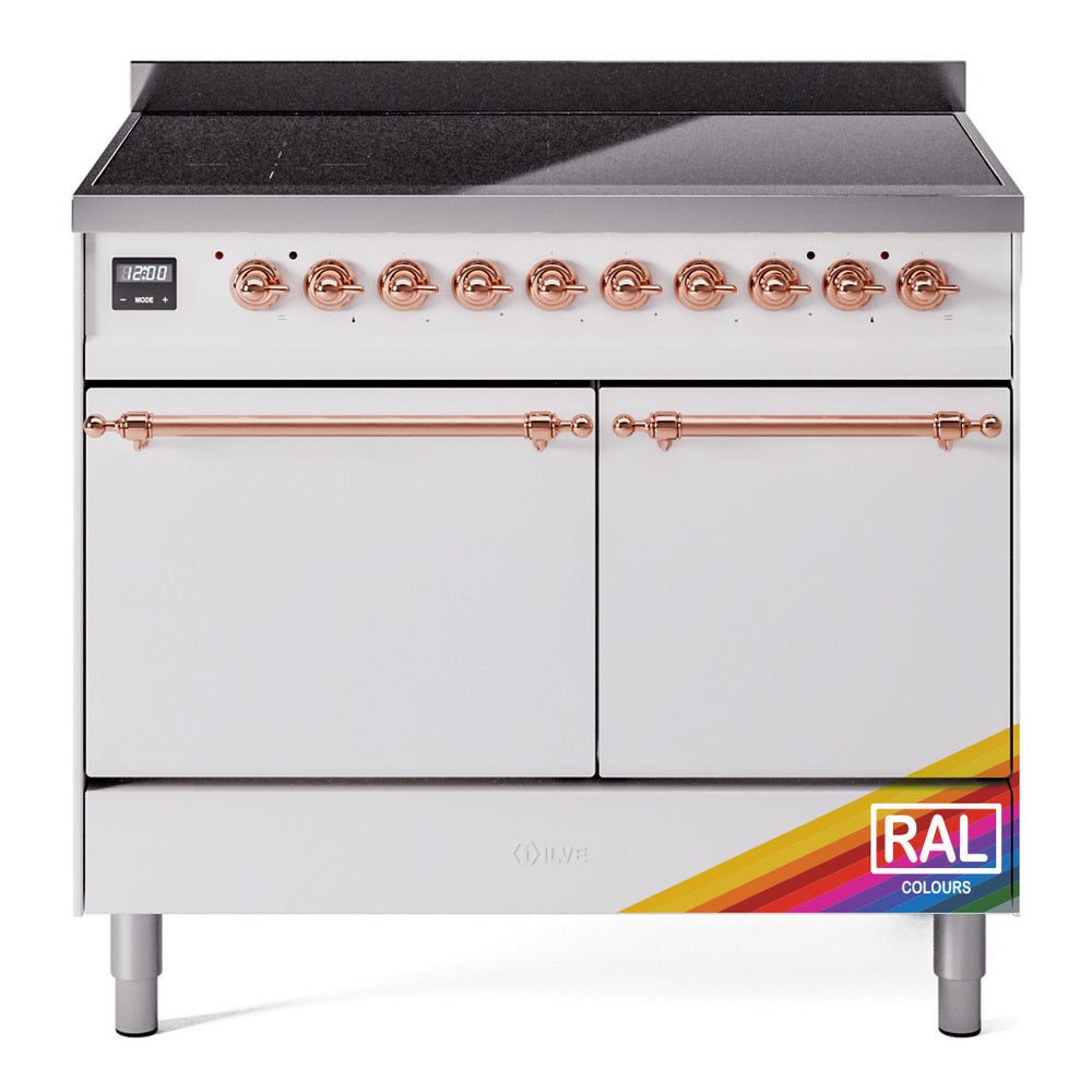 Freestanding induction range with two doors, copper handles, control knobs, and RAL badge