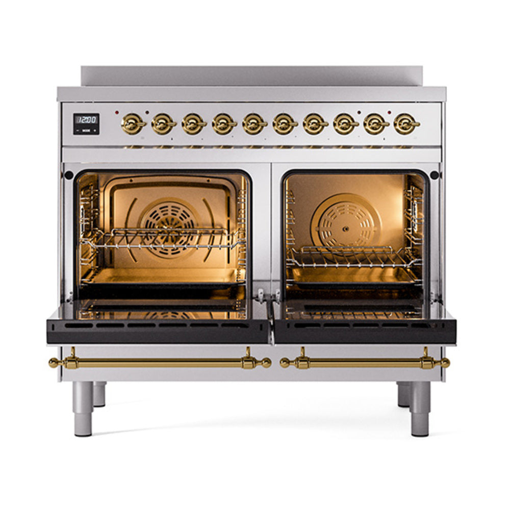 Stainless induction range with two open brass-trimmed oven doors and wire racks