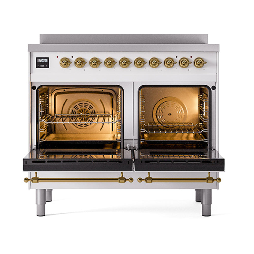 White induction range with open dual ovens and brass-trim control knobs