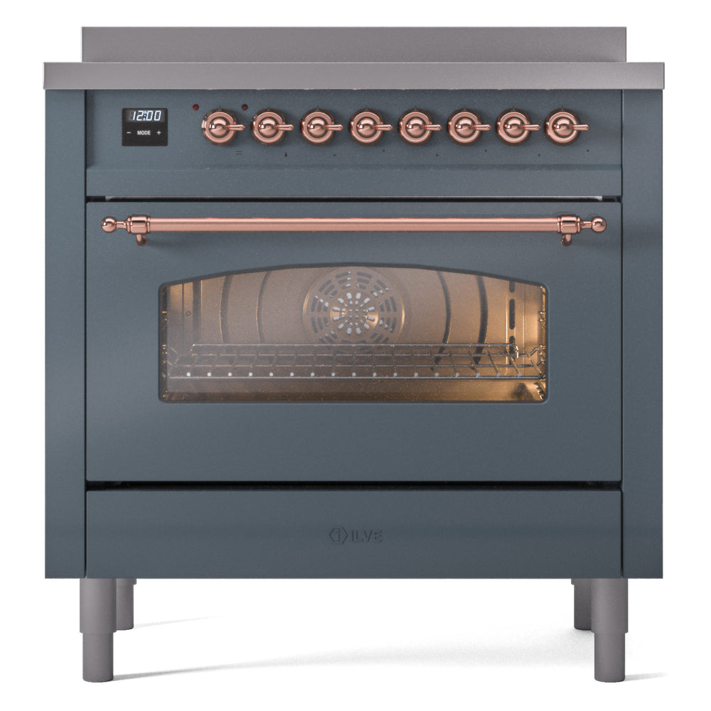 Blue grey freestanding induction range with copper-trim knobs and glass oven door