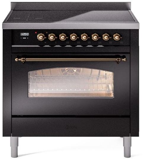 Freestanding electric induction range front view with bronze knobs and glass oven door