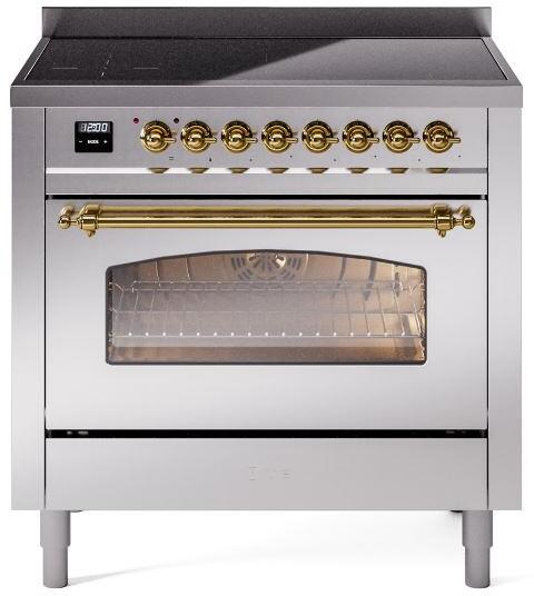 Stainless induction range with open oven door, brass knobs, and glass window