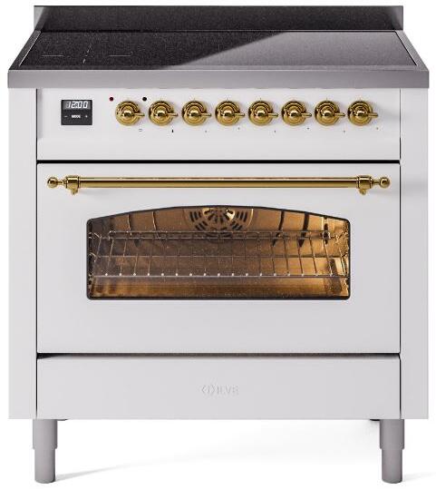 White induction range with open oven door, brass handle, and glass window