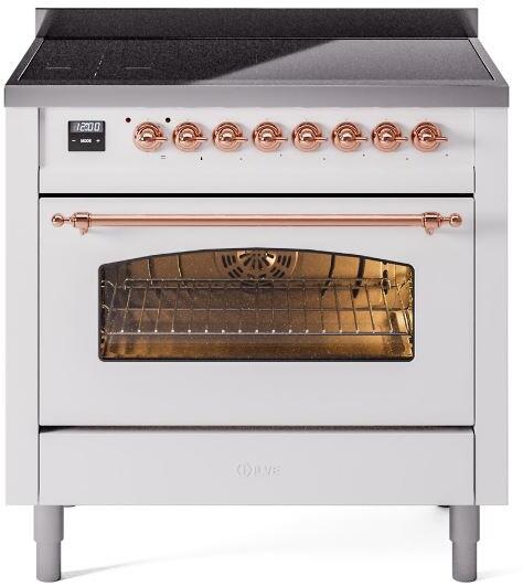 White freestanding induction range with open oven door window and copper bar handle, front controls.