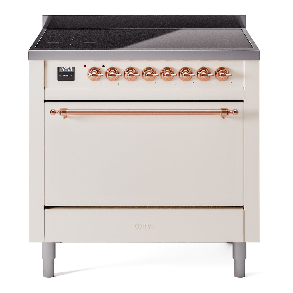 36-inch induction range front view with closed oven door and copper control knobs