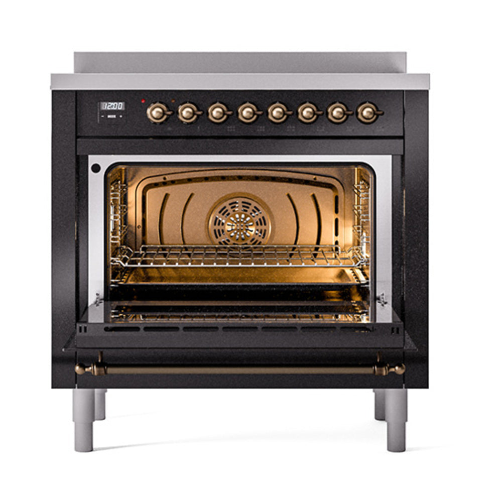 Glossy black oven door range with open gold interior and wire rack