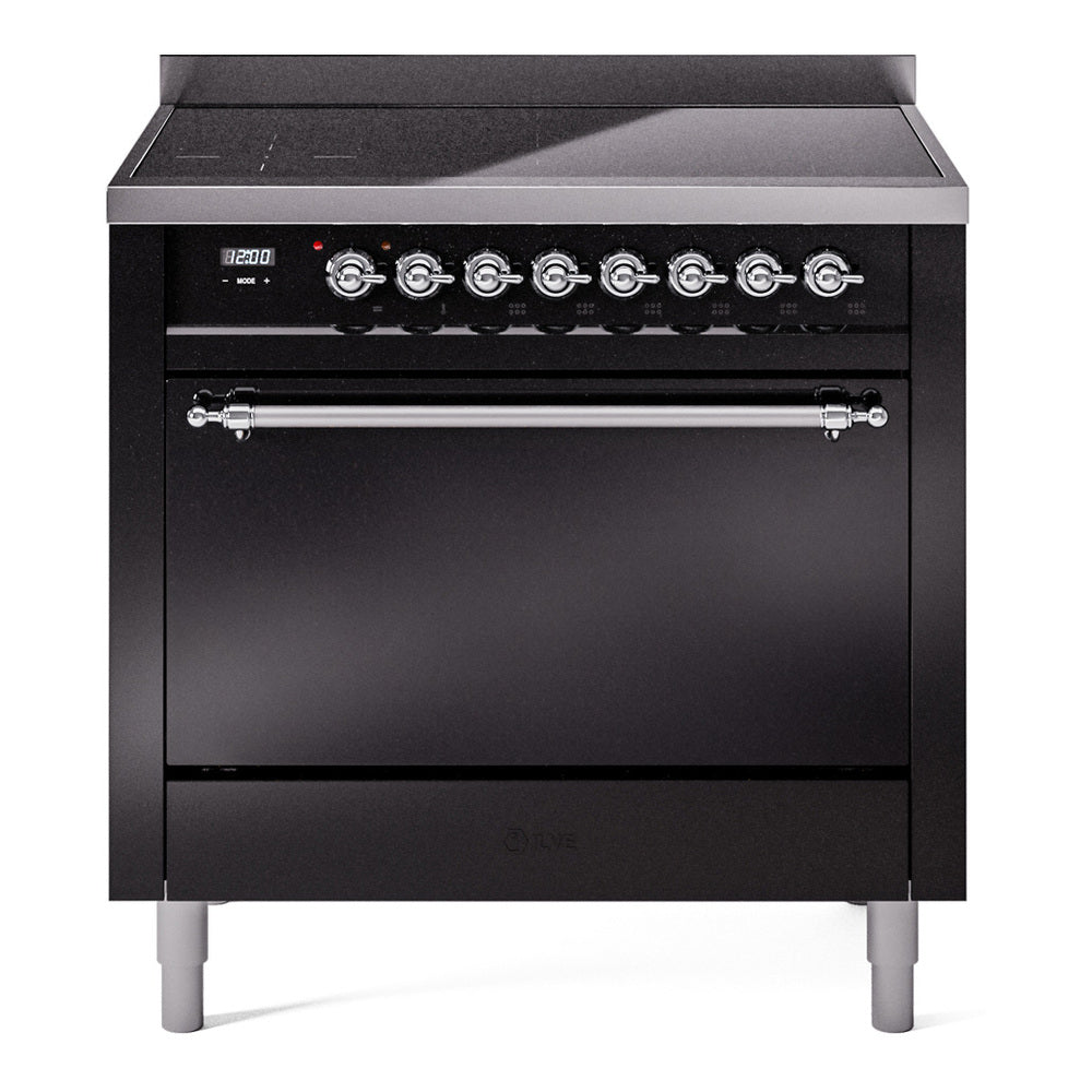 Glossy black induction range with control knobs and closed oven door on legs