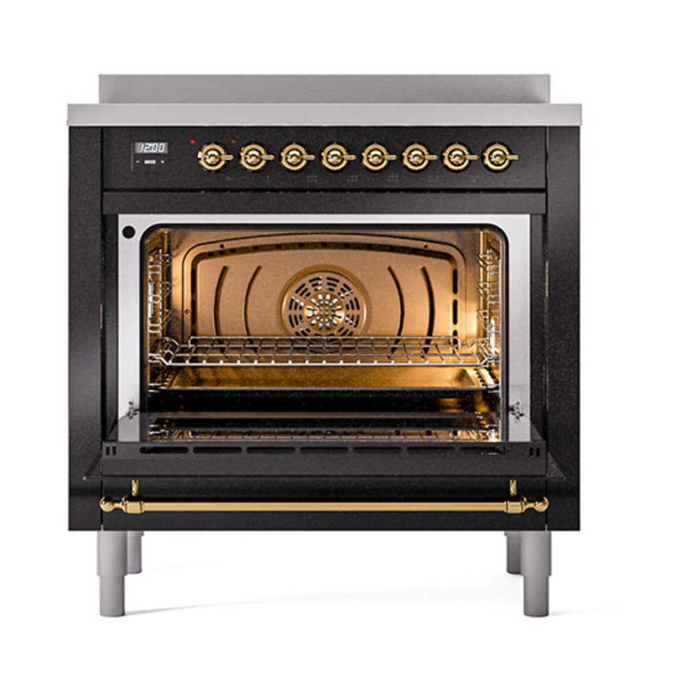Glossy black induction range with open solid door oven and brass-trim controls