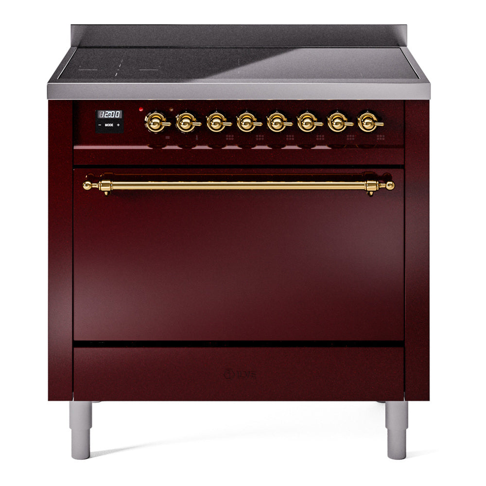 Burgundy induction range with black cooktop, brass knobs, and solid oven door